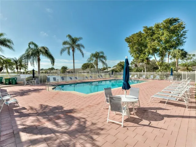 Community pool with plenty of seating