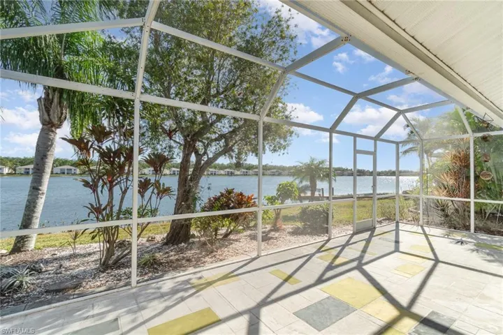 View of extended lanai with a lake view