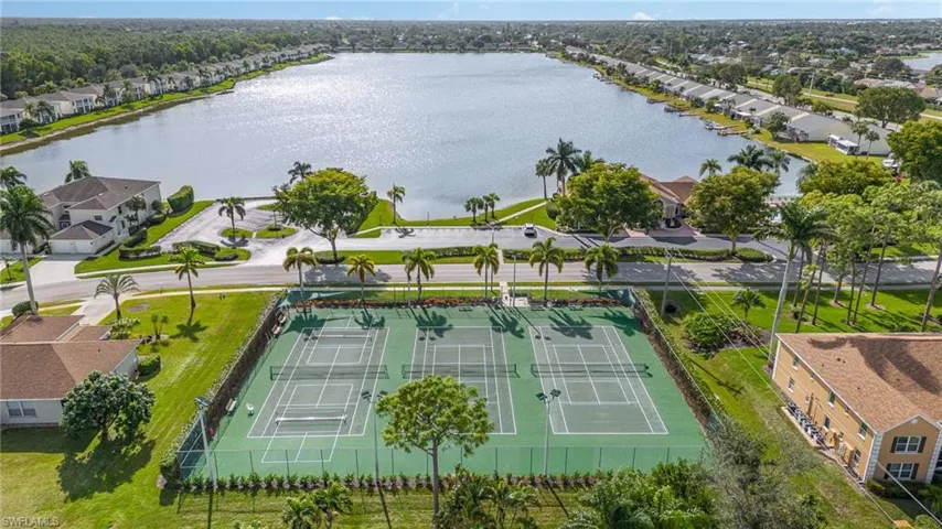 Tennis courts and a southern lake view