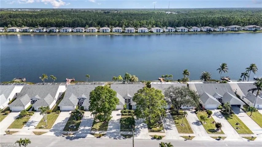 Aerial view of the home with lake view looking east