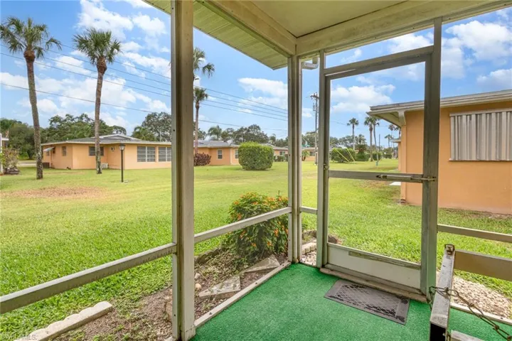 Unfurnished sunroom featuring plenty of natural light