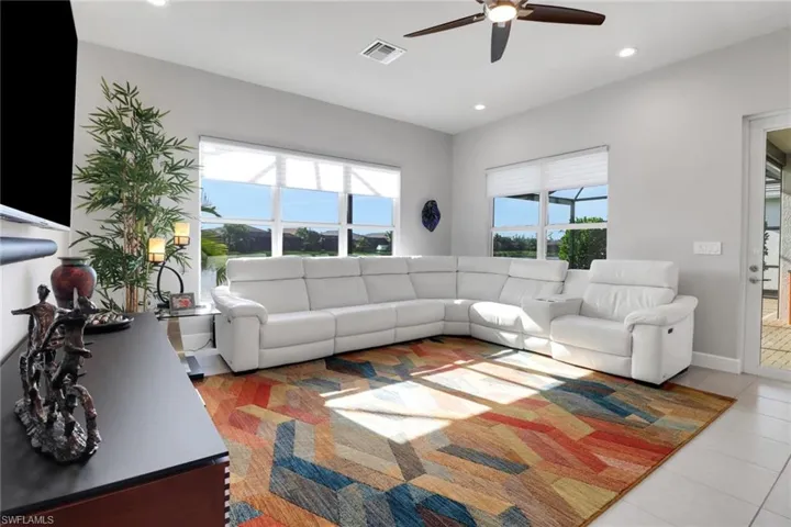 Family room has large windows for lots of  natural light