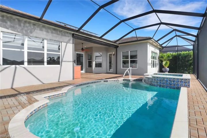 Generously sized lanai offers room for multiple seating areas, perfect for gatherings or quiet lounging