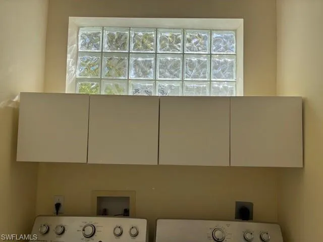 Laundry area with hookup for a washing machine and electric dryer hookup