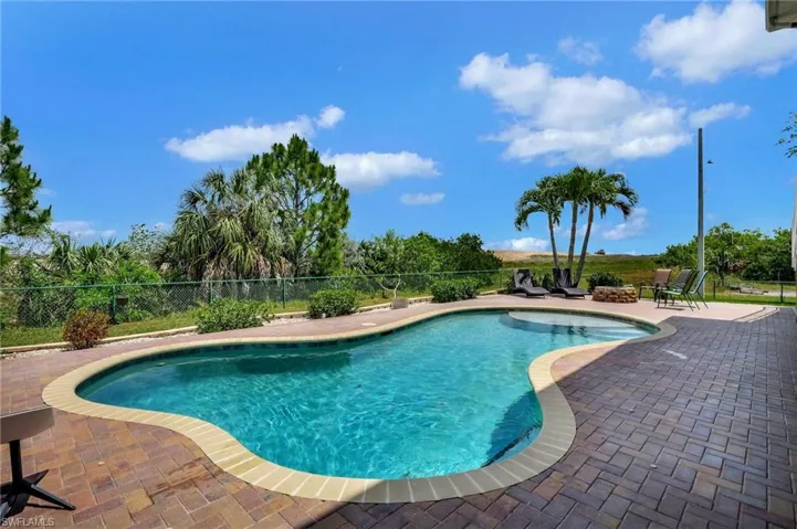 Beautiful pool with large sun deck & firepit