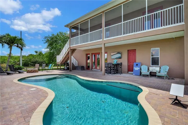 Pool, screened porch,deck and covered patio