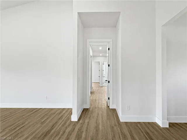 Hall to Bedrooms with door that can be closed for privacy and noise-reduction