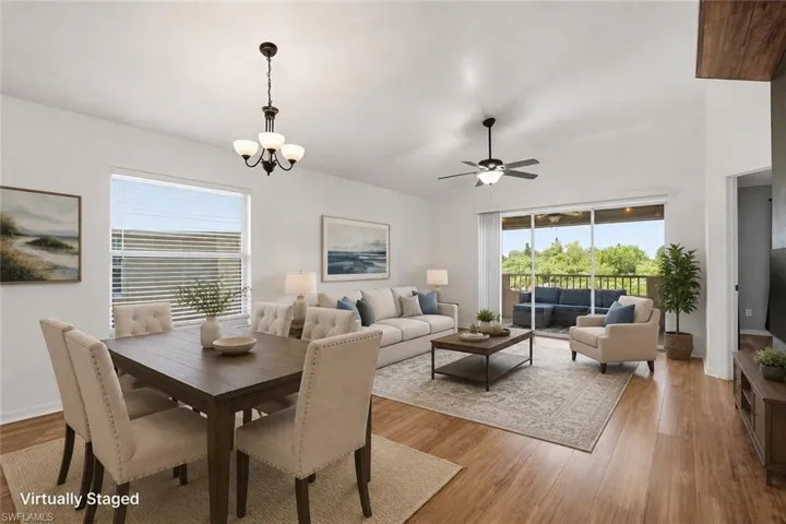 Vaulted ceilings, wood-finish flooring, and natural light