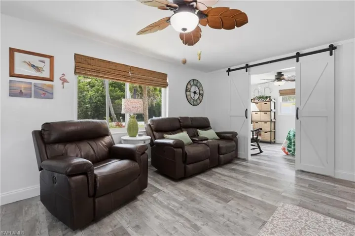 Light flooring complements white walls