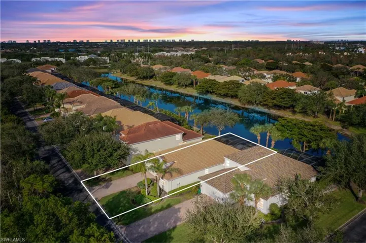 Aerial view at dusk with a water view