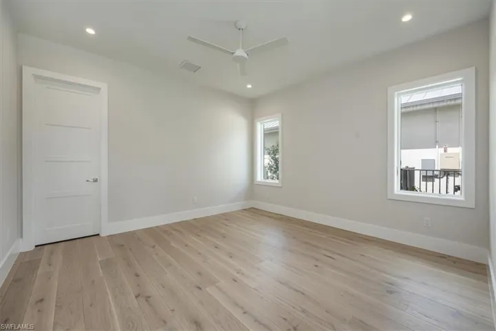 Bedroom 3 with walk-in closet complete with copewood shelving