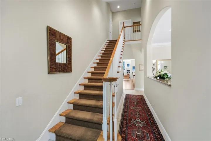 To Upper-Floor Bed/Bath Suite