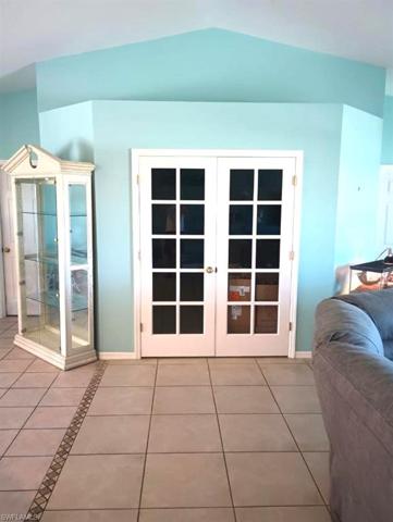Den /  Dining room with french doors