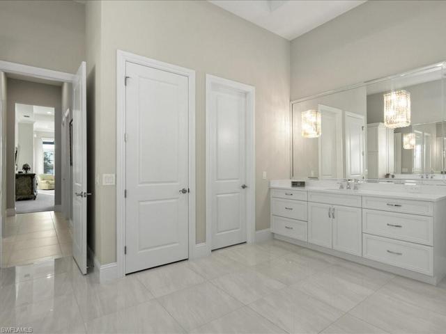 Customized Master Bathroom Feat. His & Her Water Closets
