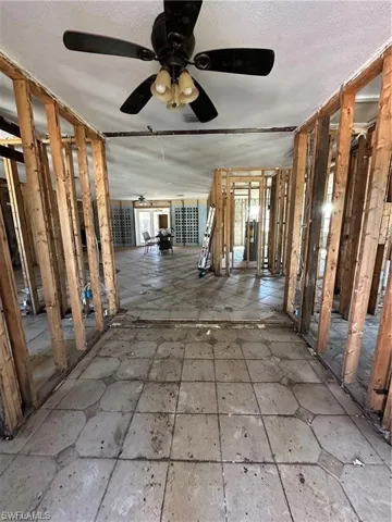 Miscellaneous room featuring a ceiling fan