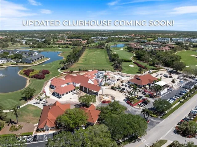 Aerial view with a residential view, golf course view, and a water view