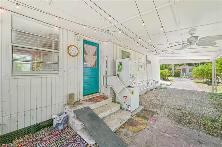 Entrance to property with ceiling fan