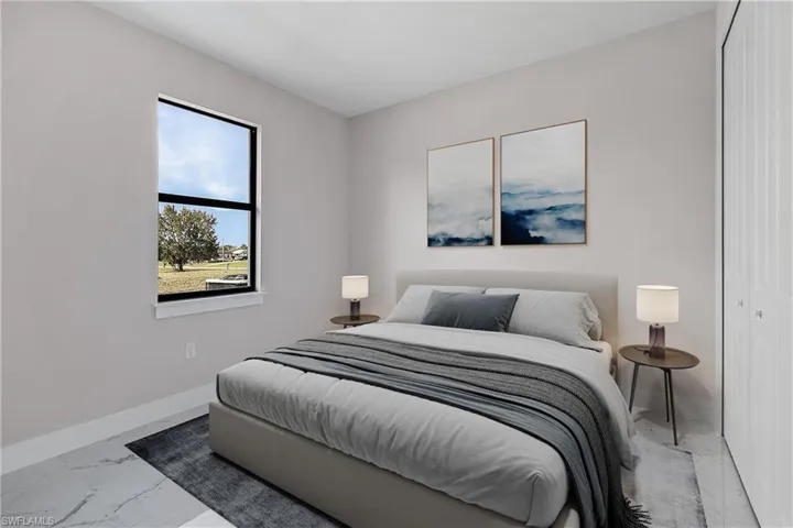 Rectangular window with black framing and white sills, light-toned walls, white baseboards, and white tile flooring