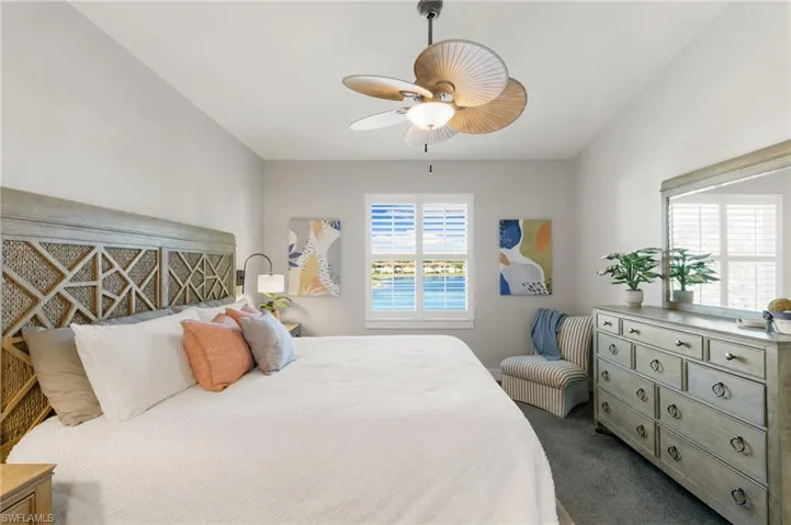 Bedroom featuring carpet floors and a ceiling fan