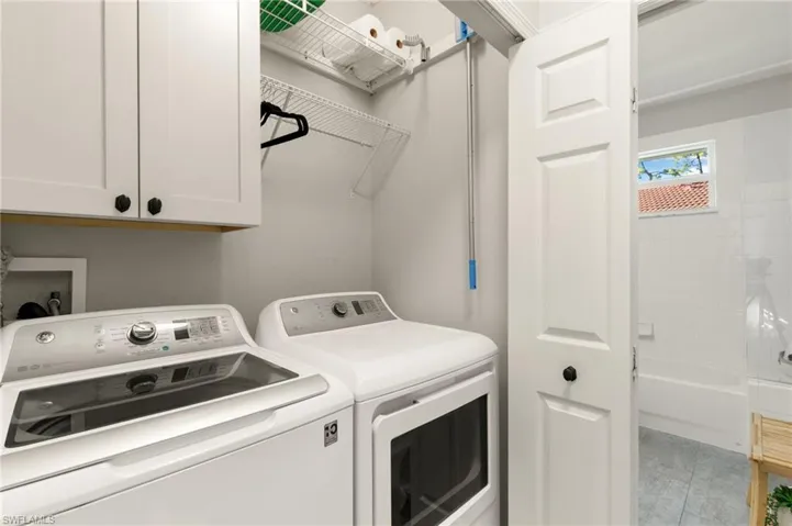Laundry room with washing machine and dryer