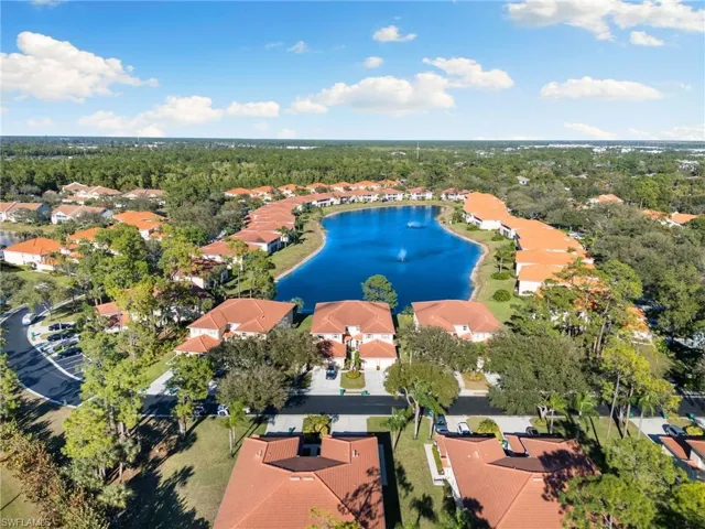 Aerial view of residential area with a large body of water