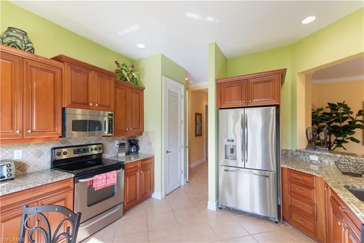 5050 Blauvelt Way 8-102, Naples, Florida 34105