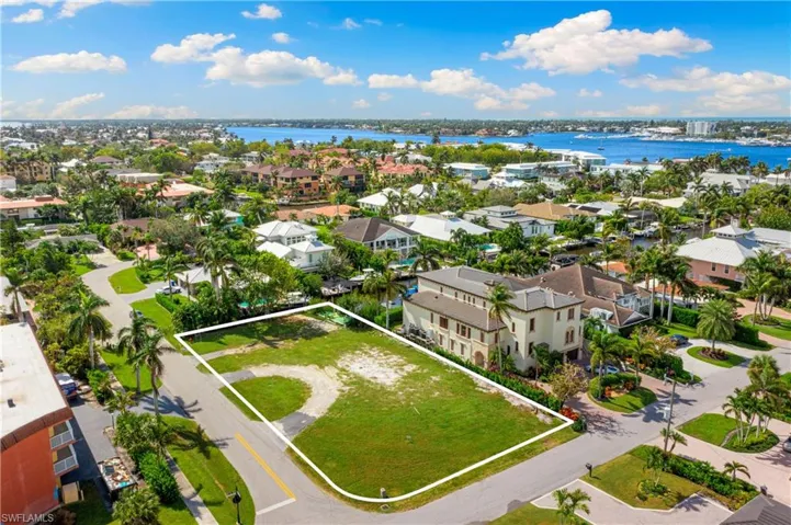 View of property location with property boundaries highlighted and a large body of water