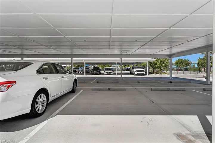 Assigned carport space which is deeded