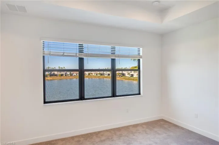 Fabulous lake views from the primary bedroom