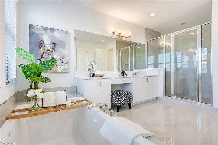 One of dual primary bathrooms with tub & shower.