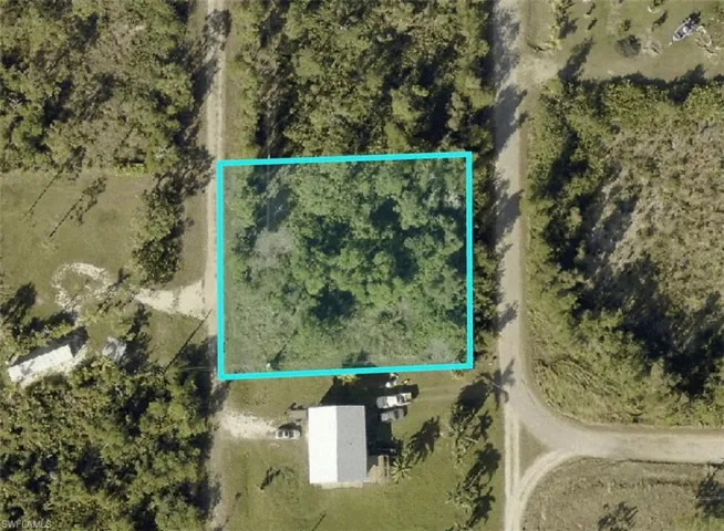 Aerial overview of property's location featuring property boundaries highlighted