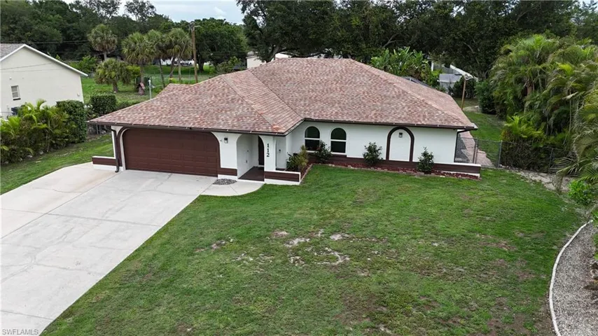 112  Jefferson  AVE, Lehigh Acres, FL 33936