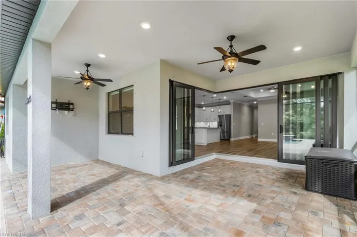 Unfurnished room with crown molding, light wood-type flooring, and recessed lighting