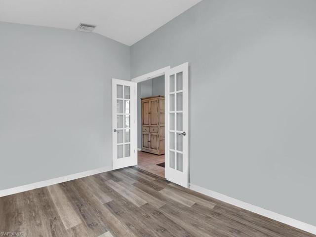 Den w/ French Door Entry