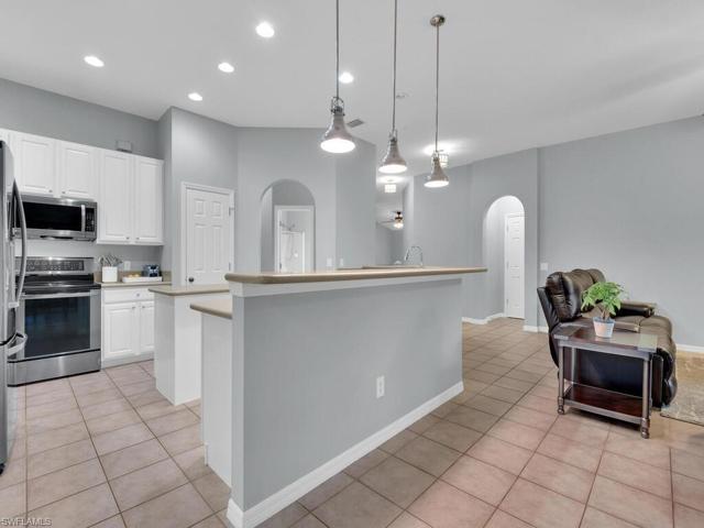 Kitchen w/ Long Breakfast Bar