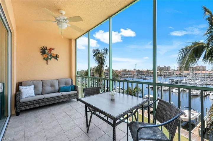 Screened balcony with a view of the harbor where you can watch the manatees play. Room for table and sitting area to enjoy the Florida weather.