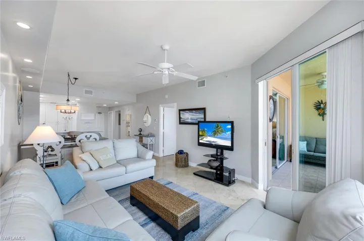 Living room toward formal dining and kitchen