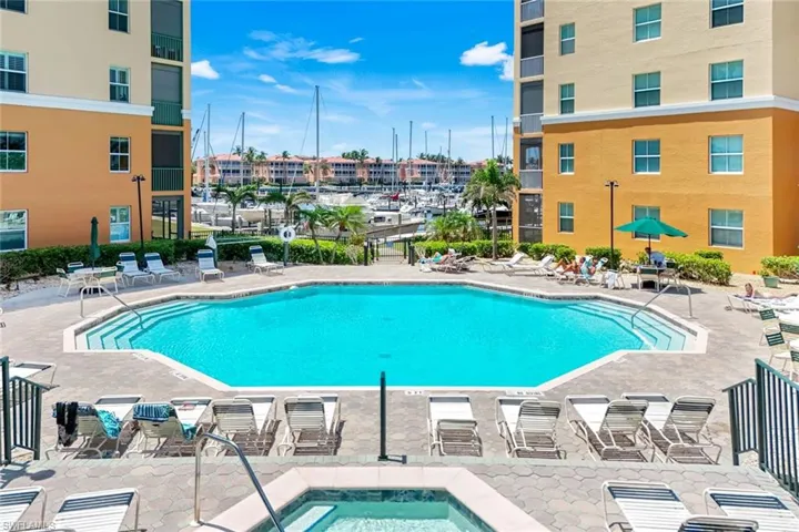 Harbor Towers residents sparkling pool with a view of the harbor