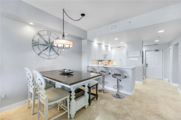Elegant formal dining room and kitchen