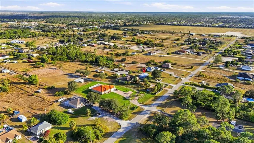 View of property location featuring nearby suburban area