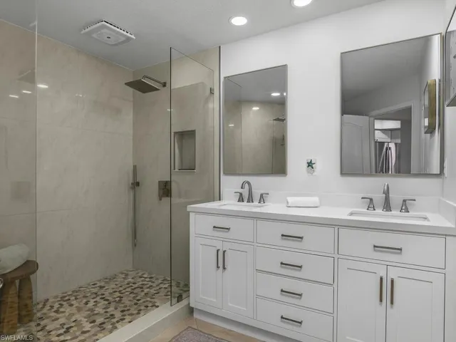 Updated Master Bath 2025 - Doorless walk-in shower with dual showerheads