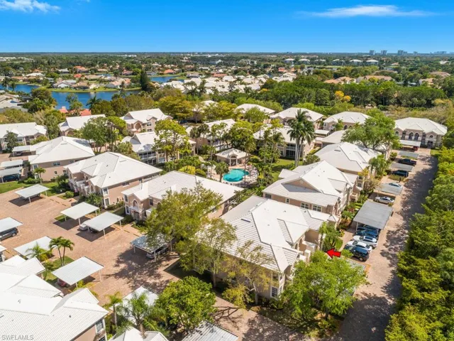 Aerial view of residential area with a large body of water
