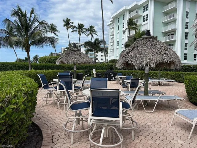 View of patio featuring a grill