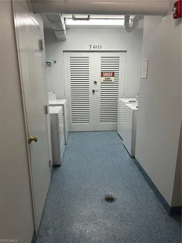 Laundry room featuring washing machine and clothes dryer