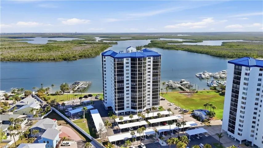 Drone / aerial view of a large body of water and numerous boat docks - Virtually Edited Image