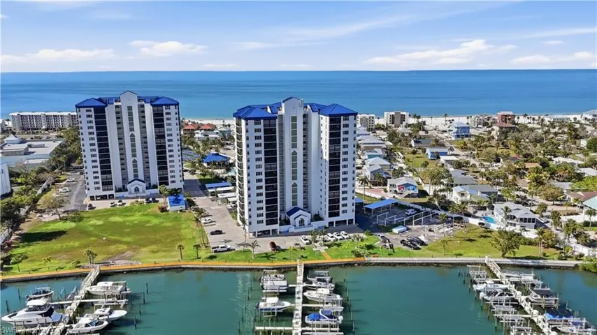 Drone / aerial view of a large body of water and numerous boat docks - Virtually Edited Image