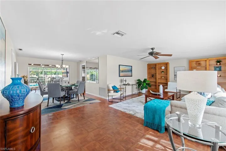 Front Living Room/ Formal Dining with pool views