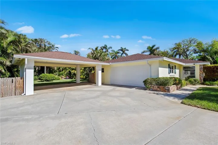 Oversize garage + 2 car carport