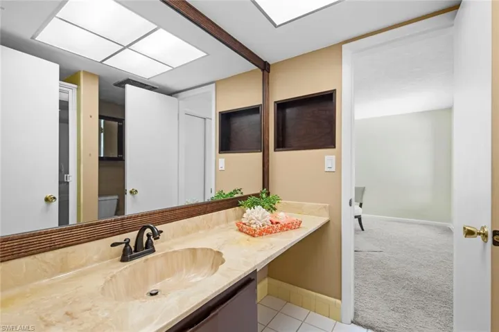 Full bath with shower adjacent to bedroom/ofice/study
