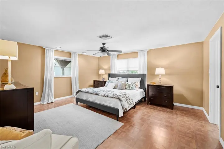 Primary bedroom with lots of natural lighting